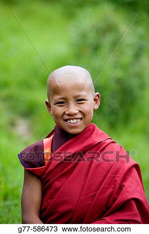 Stock Image - Bhutan. Buthang Valley. Young Buddhist Monk.. Fotosearch
