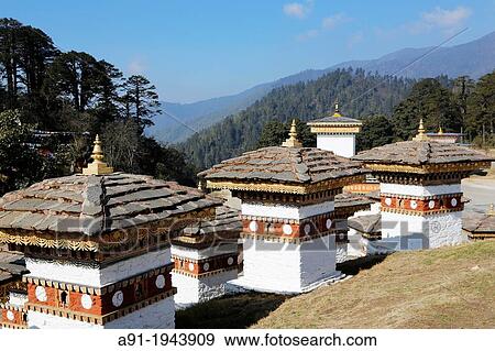 Stock Photo - Bhutan (kingdom of), the road from Thimphu to Punakha trough Dochu-la pass (3000 m), the Druk Wangyal monument made of 108 chorten. Fotosearch