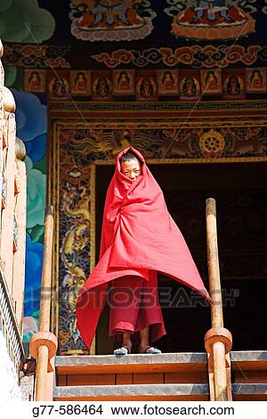 Picture - Bhutan. Punakha. Punakha Dzong Monastery. Little Buddhist Monk.. Fotosearch