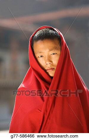 Stock Photograph - Bhutan. Punakha. Punakha Dzong Monastery. Buddhist Monk.. Fotosearch