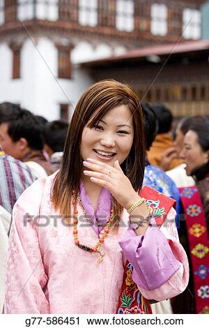 Stock Image - Bhutan. Thimpu. Bhutanese girl.. Fotosearch