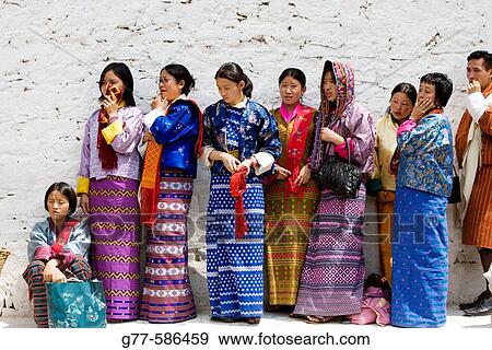 Bhutan. Thimpu. Thimpu Dzong Monastery. Buddhist Festival (Tsechu). Bhutanese women. View Large Photo Image Stock Photo - Bhutan. Thimpu. Thimpu Dzong Monastery. Buddhist Festival (Tsechu). Bhutanese women.. Fotosearch