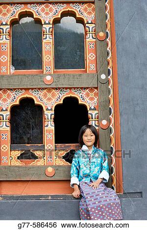 Bhutan. Thimpu. Thimpu Dzong Monastery. Buddhist Festival (Tsechu). Bhutanese little girl. View Large Photo Image Stock Photograph - Bhutan. Thimpu. Thimpu Dzong Monastery. Buddhist Festival (Tsechu). Bhutanese little girl.. Fotosearch