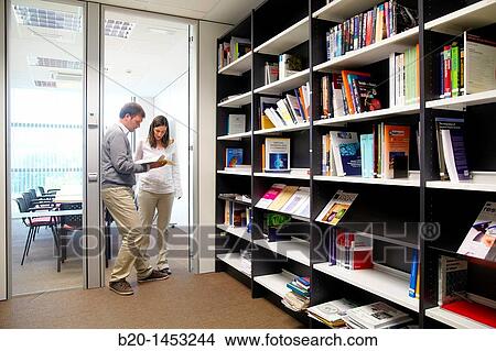 Picture - Bibliography, consulting scientific article, looking for information on digital TV and multimedia services, library, Vicomtech-IK4 Visual Interaction and Communication Technologies Centre. Fotosearch