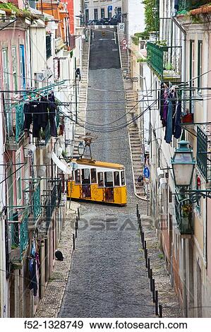 Bica funicular crossing the Travessa do Sequeiro street, Chiado district, Lisbon, Portugal View Large Photo Image Stock Photo - Bica funicular crossing the Travessa do Sequeiro street, Chiado district, Lisbon, Portugal. Fotosearch
