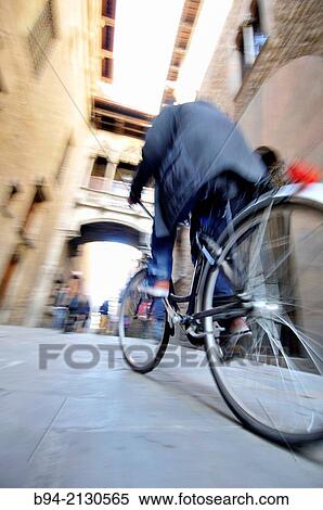 Bicycle. Bisbe street between Sant Jaume square and Nova square. Gothic area. Ciutat Vella district. Noegothic bridge, 1928, by architect Joan Rubia between Canonges house and Generalitat Palace, Barcelona, Catalonia, Spain View Large Photo Image Stock Photography - Bicycle. Bisbe street between Sant Jaume square and Nova square. Gothic area. Ciutat Vella district. Noegothic bridge, 1928, by architect Joan Rubia between Canonges house and Generalitat Palace, Barcelona, Catalonia, Spain. Fotosearch