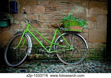 Stock Photograph - Bicycle in the old town of Bergerac, Aquitaine, Dordogne, France. Fotosearch