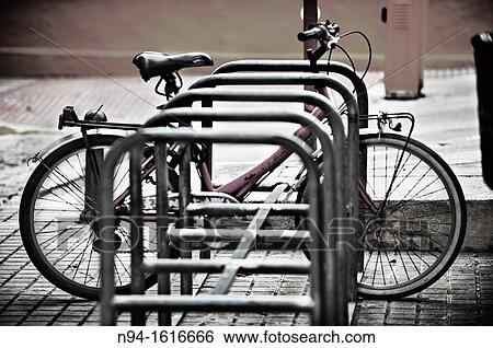 Bicycle parking Along the City of Denia. Alicante. Valencia. Spain. View Large Photo Image Stock Photograph - Bicycle parking Along the City of Denia. Alicante. Valencia. Spain.. Fotosearch