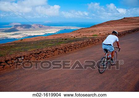 Bicycle route in Lanzarote, Canary Islands, Spain View Large Photo Image Picture - Bicycle route in Lanzarote, Canary Islands, Spain. Fotosearch