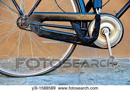 Bicycle with deflated rear tire, Florence, Italy View Large Photo Image Stock Photo - Bicycle with deflated rear tire, Florence, Italy. Fotosearch