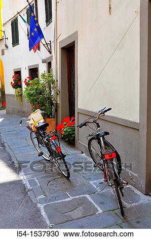 Stock Image - Bicycles Lucca Italy Tuscany Europe Mediterranean. Fotosearch