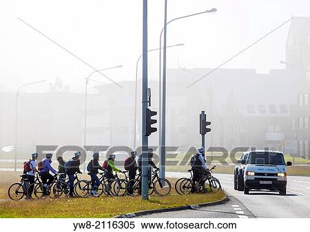 Bicycling Riding on a foggy day in Reykjavik, Iceland. View Large Photo Image Stock Photography - Bicycling Riding on a foggy day in Reykjavik, Iceland.. Fotosearch