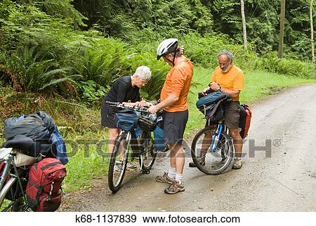 Stock Photo - bicyclists on Galiano Island, Gulf Islands, British Columbia, Canada. Fotosearch