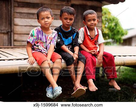 Bidayu Kid in Kidding Village Borneo Highland, Kuching, Sarawak, Borneo, Malaysia View Large Photo Image Picture - Bidayu Kid in Kidding Village Borneo Highland, Kuching, Sarawak, Borneo, Malaysia. Fotosearch