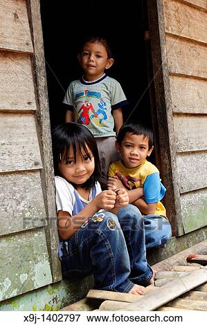 Bidayu Kid on Kidding Village Borneo Highland, Kuching, Sarawak, Borneo, Malaysia. View Large Photo Image Stock Photo - Bidayu Kid on Kidding Village Borneo Highland, Kuching, Sarawak, Borneo, Malaysia.. Fotosearch