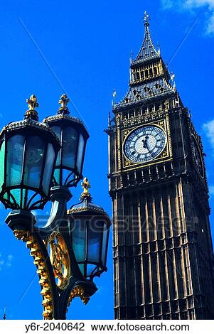 Big Ben and Victorian gas lamps on a sunny day in London, England. View Large Photo Image Stock Image - Big Ben and Victorian gas lamps on a sunny day in London, England.. Fotosearch
