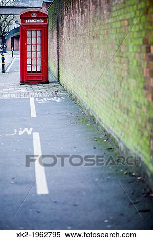 Big red booth in the middle of a bike route, near Elephant and Castle, London, UK View Large Photo Image Stock Photography - Big red booth in the middle of a bike route, near Elephant and Castle, London, UK. Fotosearch