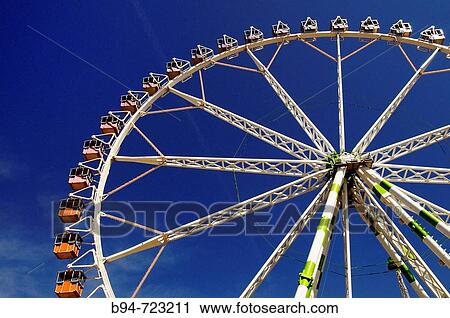 Big wheel at Feria de Abril (April fair), Barcelona. Catalonia, Spain View Large Photo Image Stock Image - Big wheel at Feria de Abril (April fair), Barcelona. Catalonia, Spain. Fotosearch