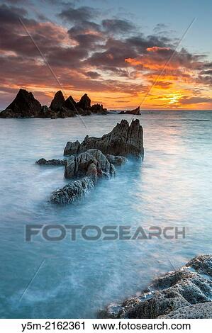 Stock Image - Bigbury Bay at sunset, Burgh Island, Bigbury-on-Sea, South Hams, Devon, England, Europe.. Fotosearch