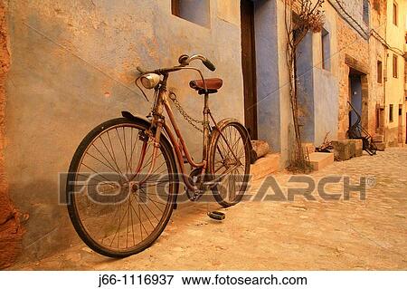 Stock Photo - Bike on street, Valderrobres, Matarraa, Teruel province, Aragon, Spain. Fotosearch