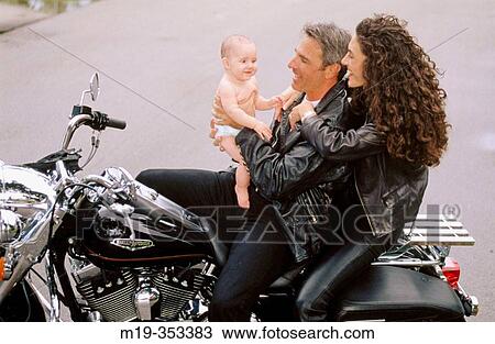 biker couple with baby View Large Photo Image Stock Image - biker couple with baby. Fotosearch