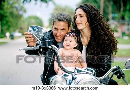biker couple with baby View Large Photo Image Stock Photograph - biker couple with baby. Fotosearch