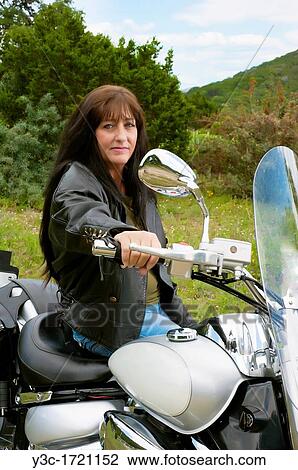 Biker Lady - Portrait of a mature Native American Woman in leather jacket with her motorcycle View Large Photo Image Stock Image - Biker Lady - Portrait of a mature Native American Woman in leather jacket with her motorcycle. Fotosearch