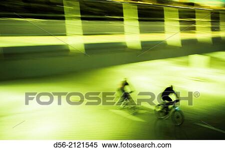 Bikers at night, Old river bed Turia, Valencia, Spain. View Large Photo Image Stock Photography - Bikers at night, Old river bed Turia, Valencia, Spain.. Fotosearch