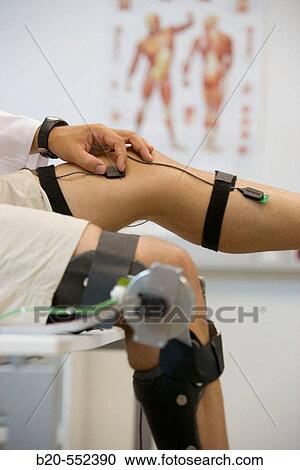 Stock Image - Biomechanics: researchers developing exoskeleton intended for people suffering from muscular weakness in the lower limbs. Fatronik Foundation, Research Technology Center. Donostia, San Sebastian, Gipuzkoa, Euskadi. Spain.. Fotosearch