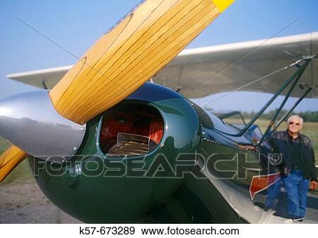 Biplane and pilot View Large Photo Image Stock Photo - Biplane and pilot. Fotosearch