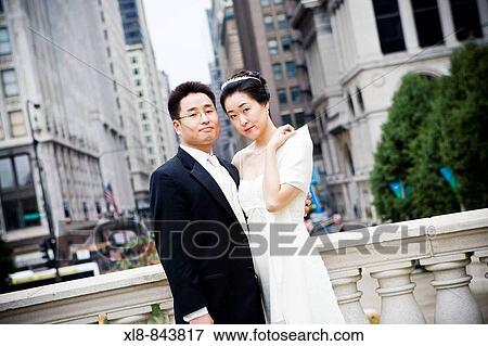 Stock Photo - birde and groom portrait downtown chicago. Fotosearch