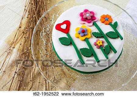 Birthday cake with sugar flowers. View Large Photo Image Stock Image - Birthday cake with sugar flowers.. Fotosearch