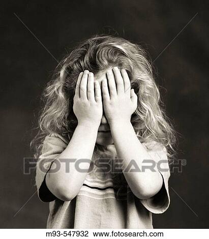 Black and white of young Caucasian girl approx. 6 years hold holding hands up to her face to cover her eyes. View Large Photo Image Stock Image - Black and white of young Caucasian girl approx. 6 years hold holding hands up to her face to cover her eyes.. Fotosearch
