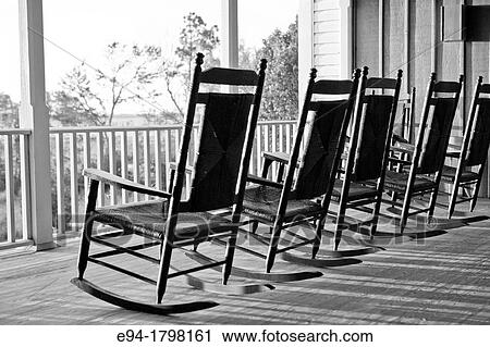 Black and white photo of rocking chairs on a porch of a home, North Carolina, USA. View Large Photo Image Stock Image - Black and white photo of rocking chairs on a porch of a home, North Carolina, USA.. Fotosearch