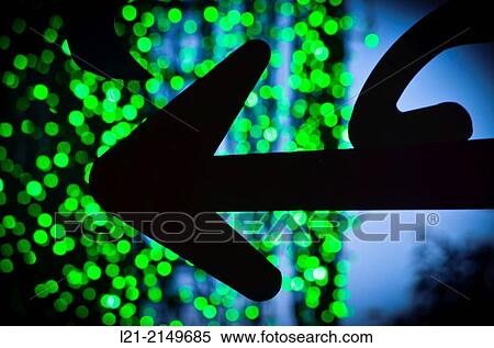 Black Arrow. Background green neon lights on. View Large Photo Image Stock Photography - Black Arrow. Background green neon lights on.. Fotosearch