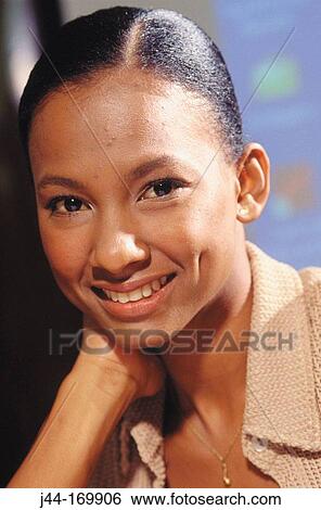 Black Hispanic woman smiling View Large Photo Image Stock Photograph - Black Hispanic woman smiling. Fotosearch