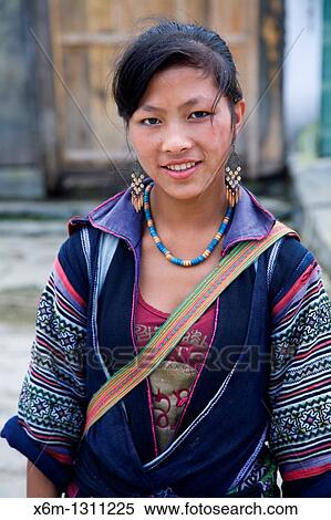 black hmong ethnic young girl in Ta Phin village Sapa, Lao Cai province, Vietnam View Large Photo Image Stock Photography - black hmong ethnic young girl in Ta Phin village Sapa, Lao Cai province, Vietnam. Fotosearch