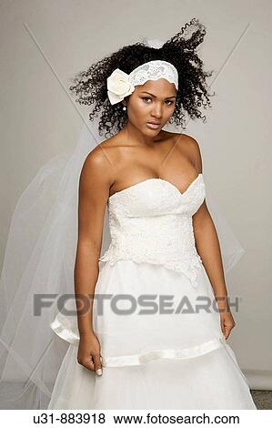 Black Latin Bride in her 20s poses in a studio setting View Large Photo Image Stock Photo - Black Latin Bride in her 20s poses in a studio setting. Fotosearch
