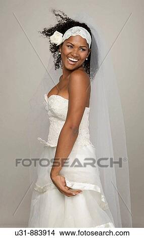 Black Latin Bride in her 20s smiles happily View Large Photo Image Picture - Black Latin Bride in her 20s smiles happily. Fotosearch