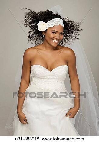 Black Latin Bride in her 20s smiles happily View Large Photo Image Stock Photography - Black Latin Bride in her 20s smiles happily. Fotosearch