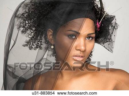 Black Latin girl with sexy wavy hair and black veil View Large Photo Image Picture - Black Latin girl with sexy wavy hair and black veil. Fotosearch