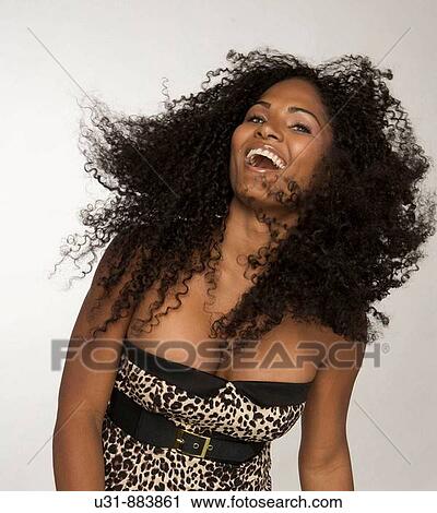 Black Latin girl with sexy wavy hair View Large Photo Image Stock Image - Black Latin girl with sexy wavy hair. Fotosearch
