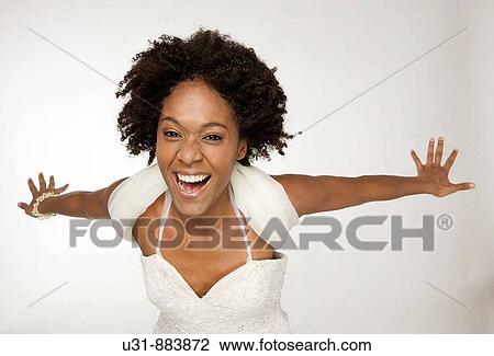 Black Latin girl with sexy wavy hair smiling screaming at the camera View Large Photo Image Stock Image - Black Latin girl with sexy wavy hair smiling screaming at the camera. Fotosearch