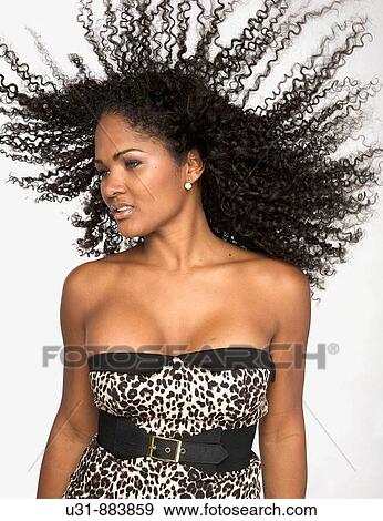 Black Latin girl with sexy wavy hair View Large Photo Image Stock Photo - Black Latin girl with sexy wavy hair. Fotosearch