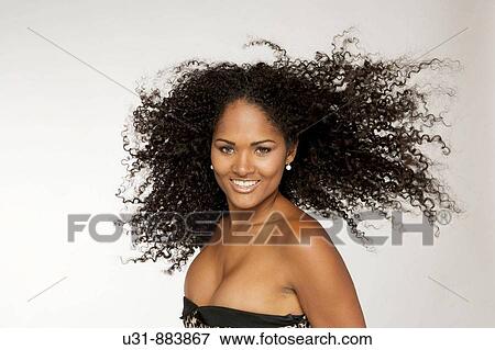 Black Latin girl with sexy wavy hair View Large Photo Image Stock Photo - Black Latin girl with sexy wavy hair. Fotosearch