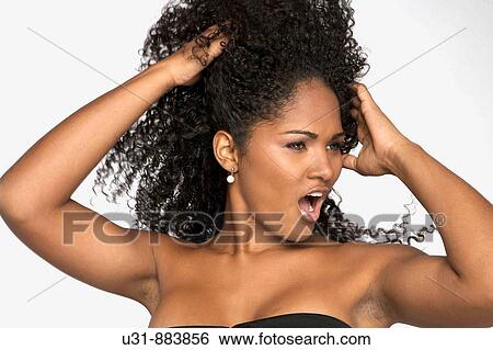 Black Latin girl with sexy wavy hair View Large Photo Image Stock Photograph - Black Latin girl with sexy wavy hair. Fotosearch