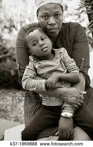 Black mother with child View Large Photo Image Stock Photo - Black mother with child. Fotosearch
