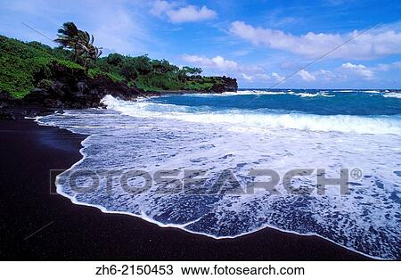 Black sand beach and surf at Waianapanapa State Park near Hana, Maui, Hawaii USA. View Large Photo Image Stock Image - Black sand beach and surf at Waianapanapa State Park near Hana, Maui, Hawaii USA.. Fotosearch