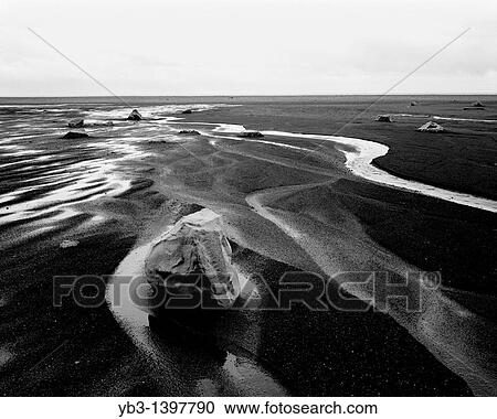 Stock Image - Black Volcanic Beach, Hofn, Iceland. Fotosearch