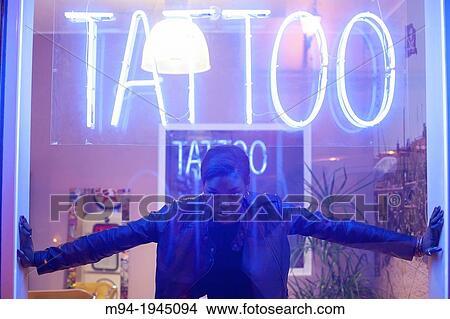 Black woman in a tattoo studio. View Large Photo Image Picture - Black woman in a tattoo studio.. Fotosearch